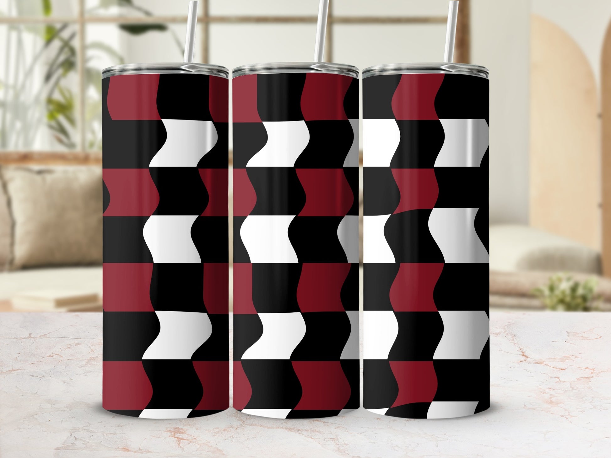 Three tumblers with a black, white, and red geometric pattern.