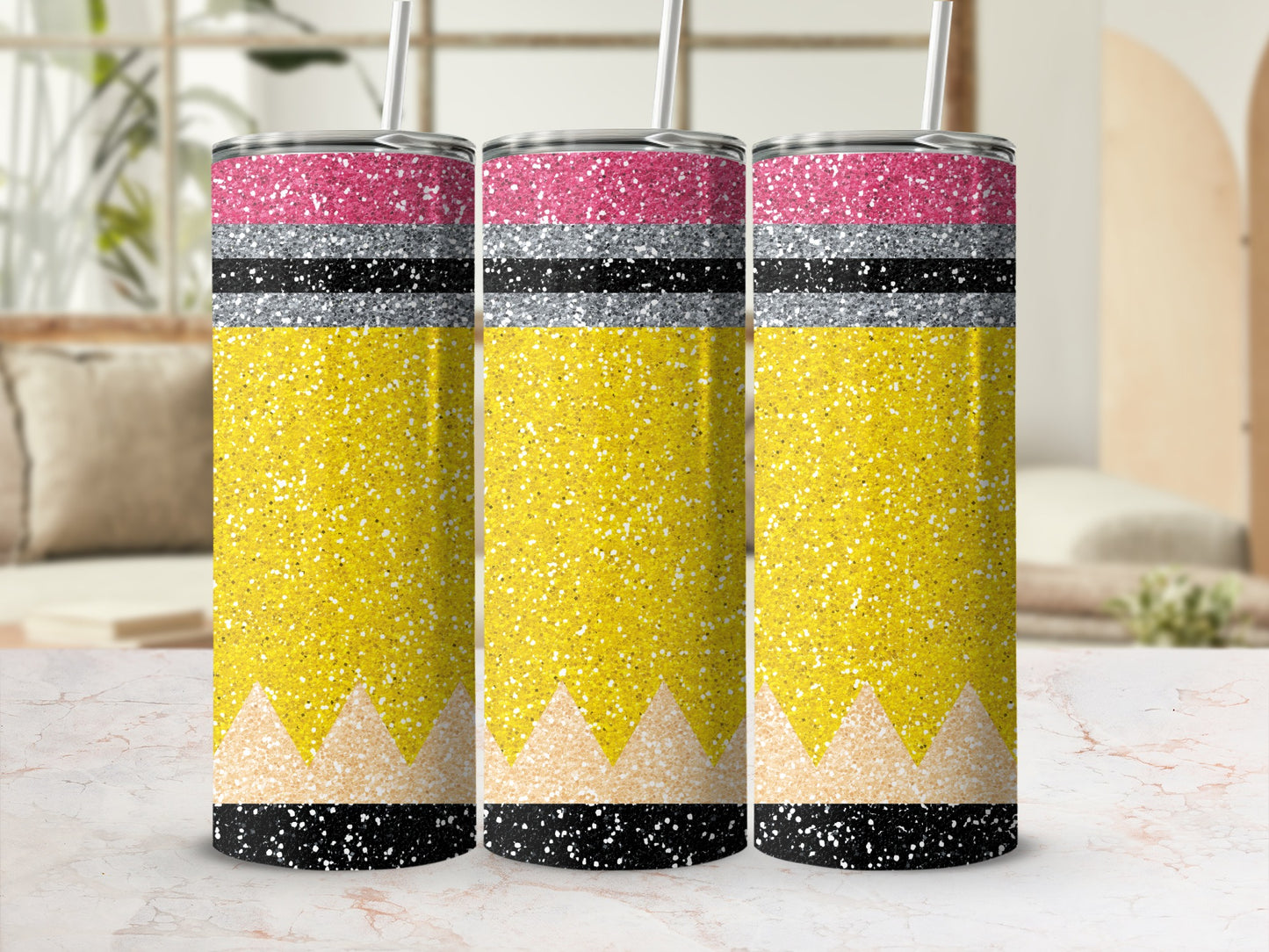 Three glitter tumblers with pencil tip designs.