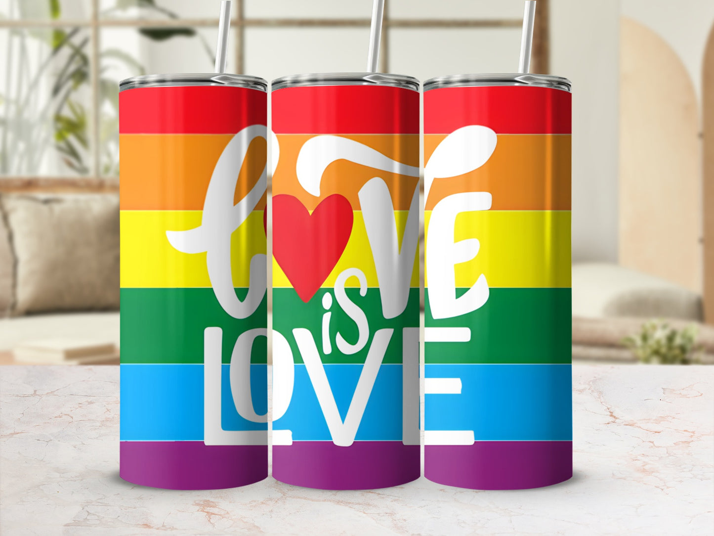 Rainbow tumbler with "LOVE" text and heart graphic.