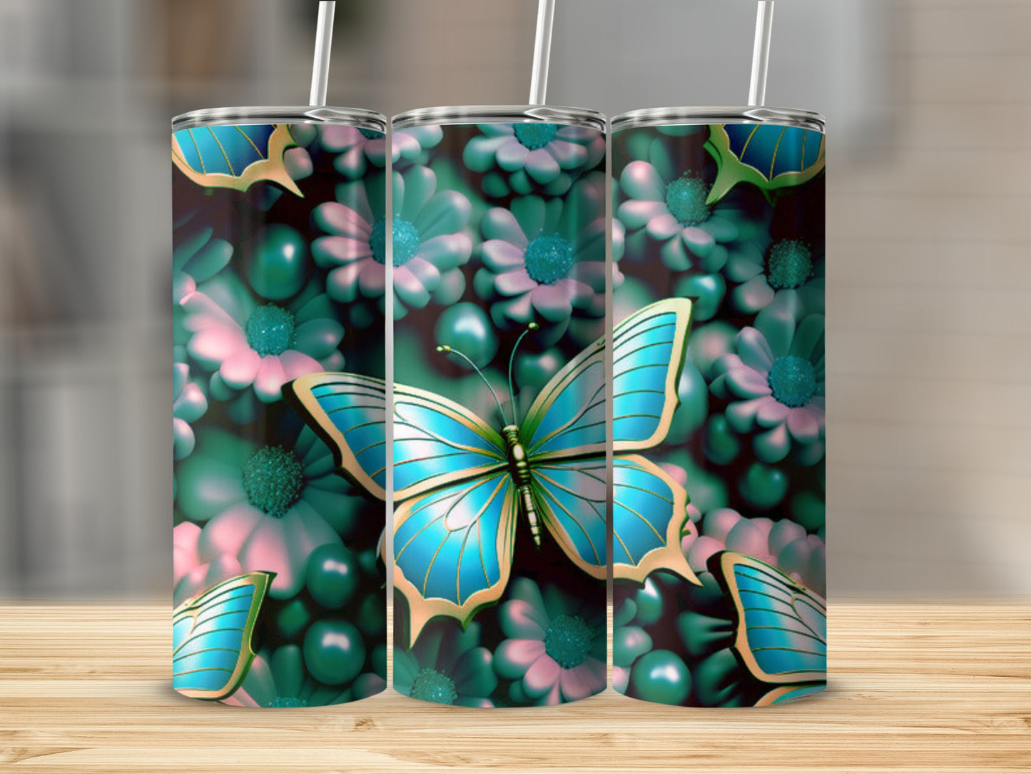 Three tumblers with a blue butterfly and pink flowers design.