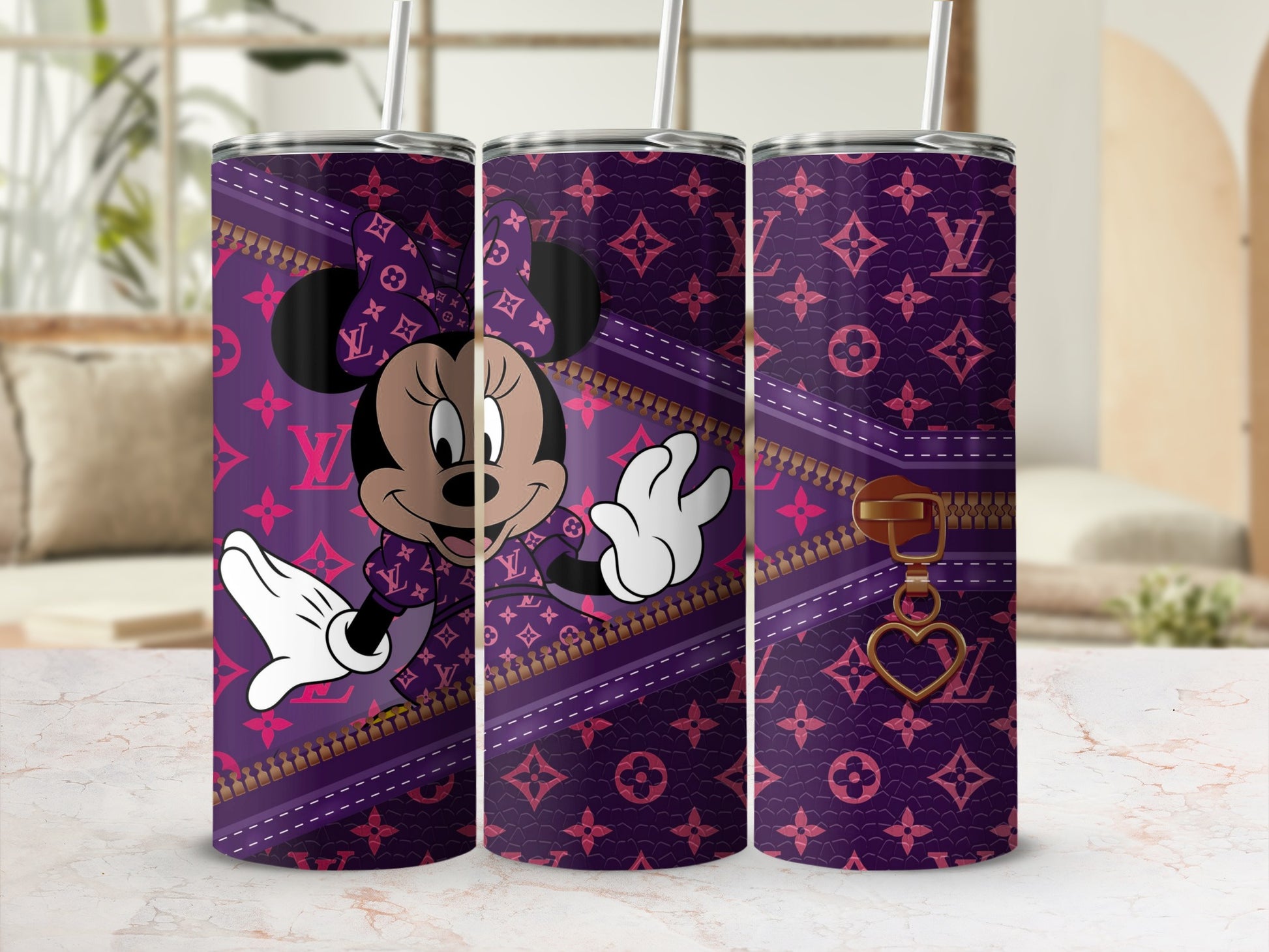 Minnie Mouse with purple LV pattern tumbler with gold zipper detail.