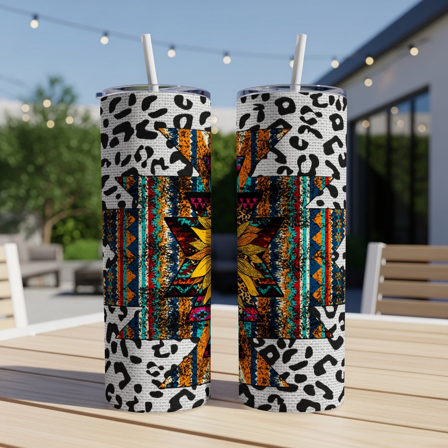 Two tumblers with leopard print and geometric Southwestern patterns.