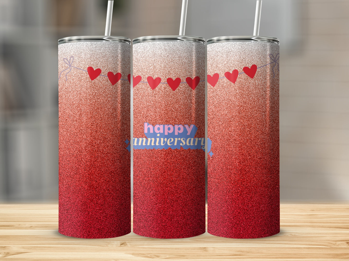 Three tumblers with red glitter and "happy anniversary" text.