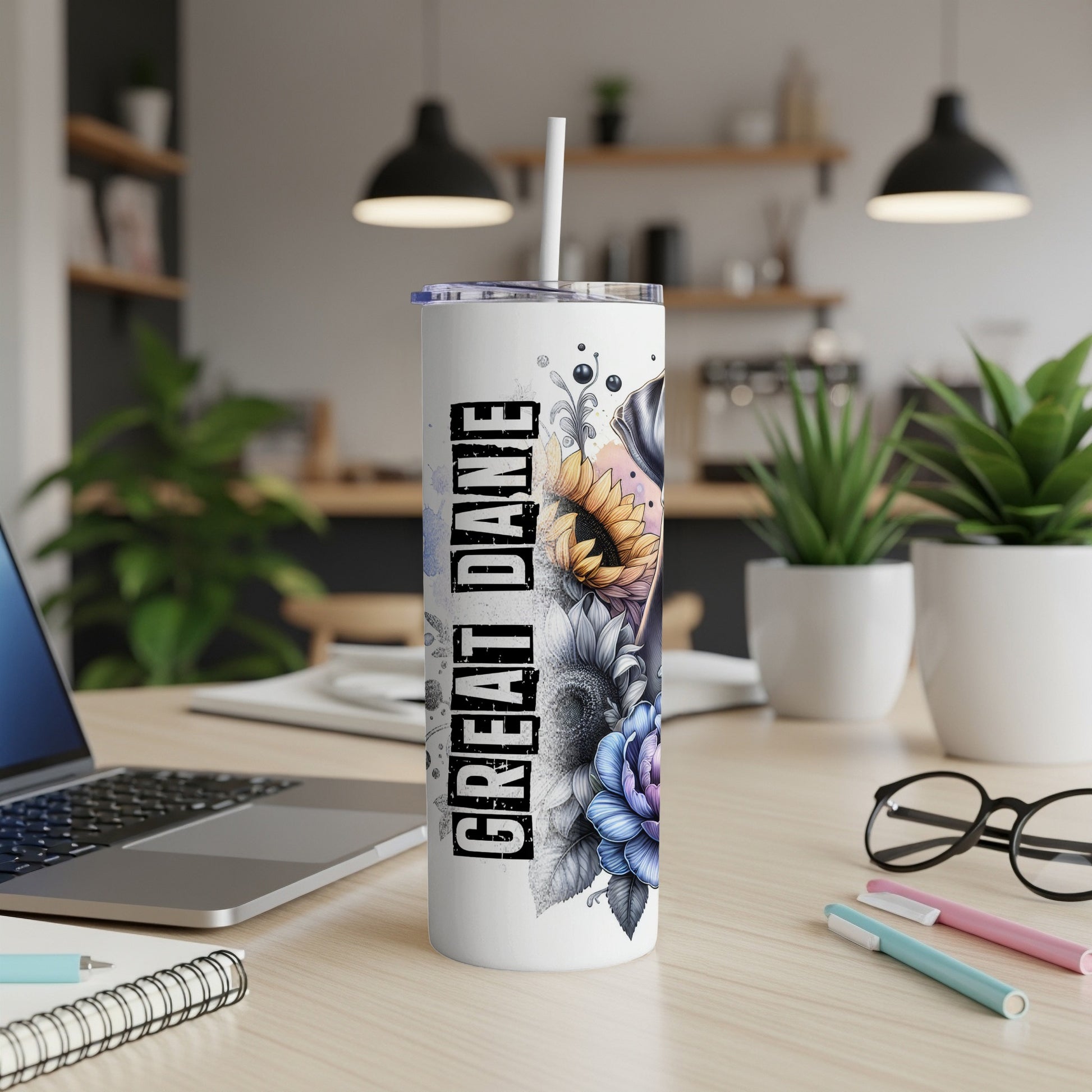 Great Dane tumbler with floral and skull design.