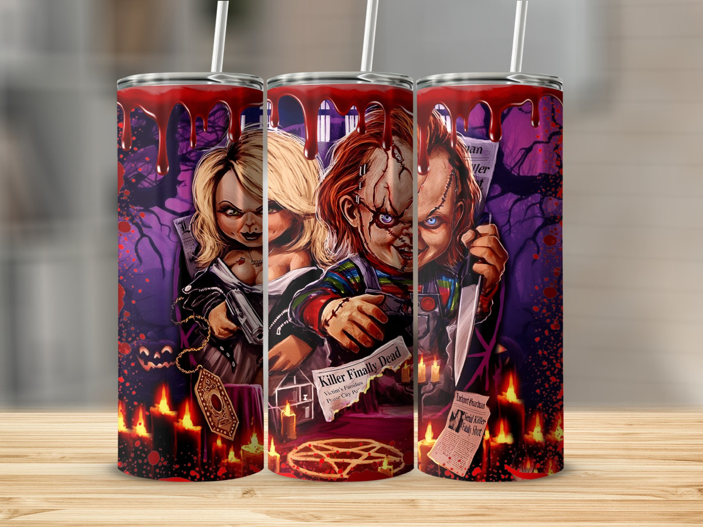 Chucky and Tiffany artwork with bloody details on three tumblers.