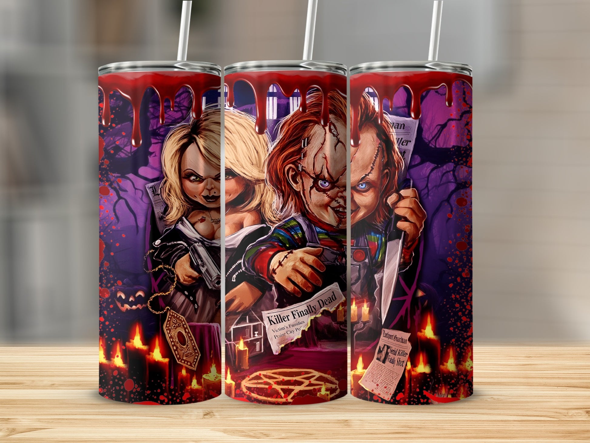 Chucky and Tiffany artwork with bloody details on three tumblers.