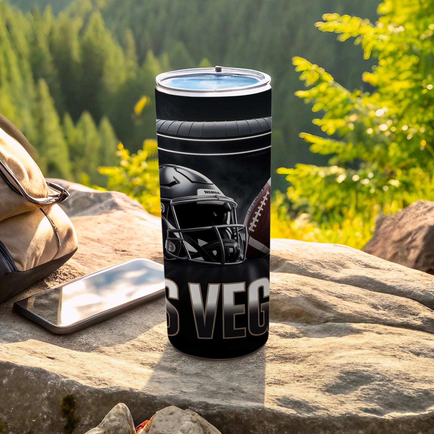 Black tumbler with football helmet and football, "Vegas" text.