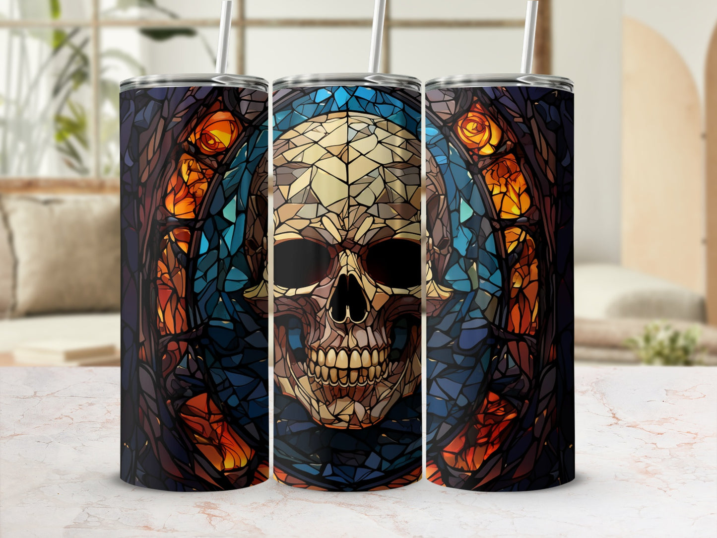 Three tall tumblers with stained-glass skull designs.