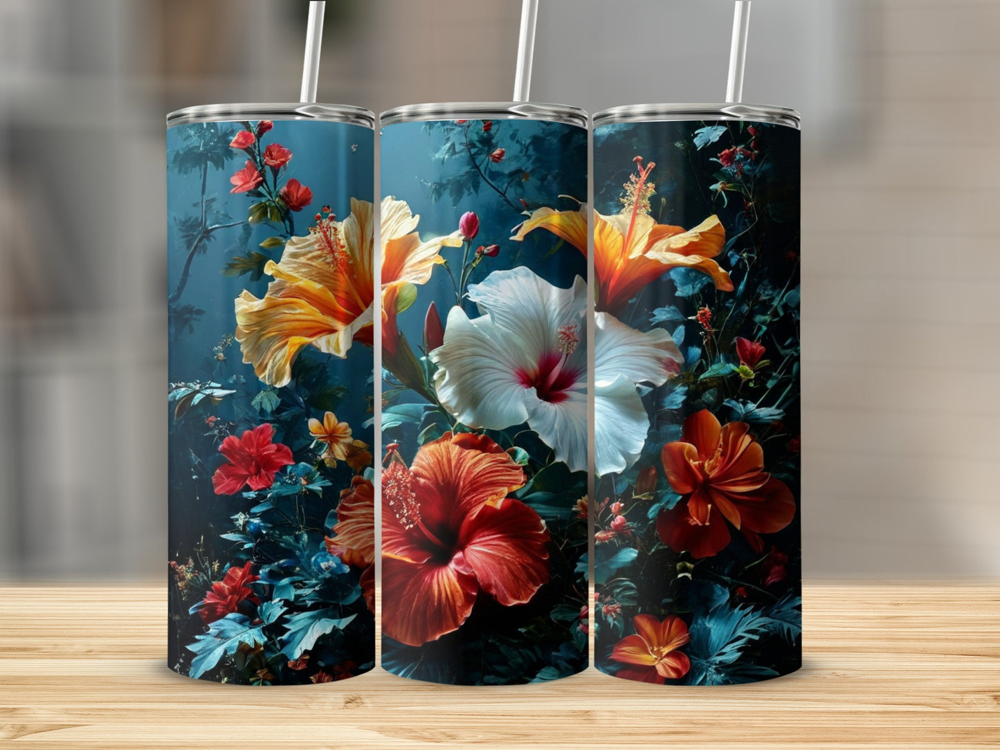 Three tumblers featuring vibrant hibiscus flowers on a dark background.