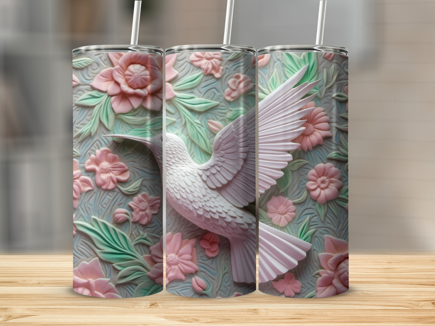 Three tumblers with white hummingbird and pink floral embossed design.