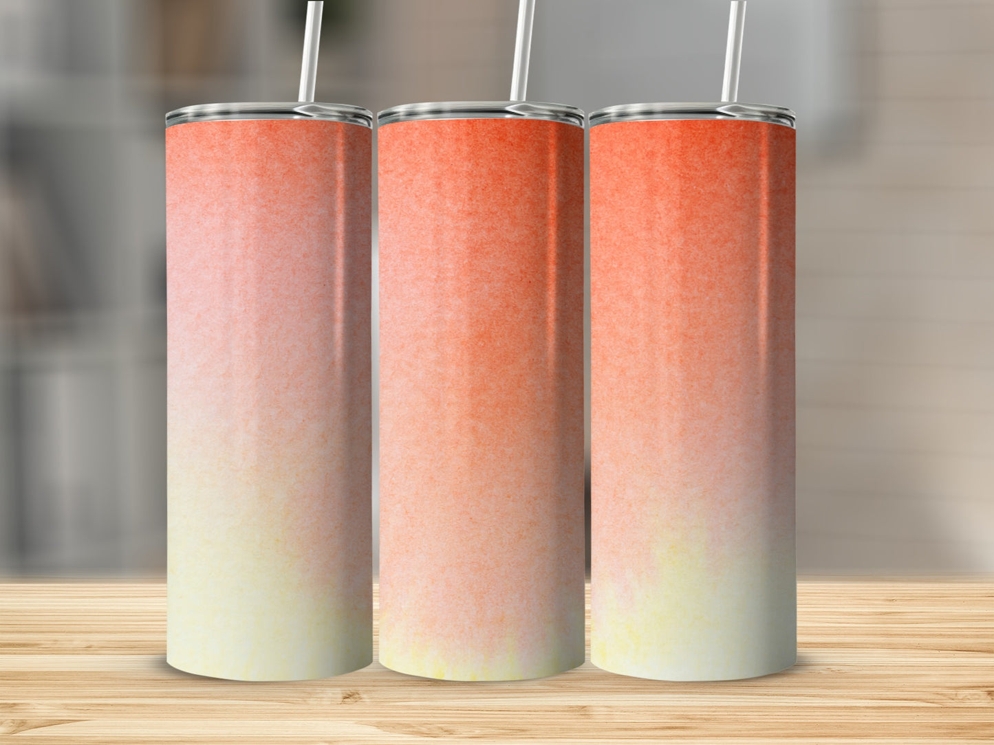Three blank sublimation tumblers with gradient coral and yellow colors.