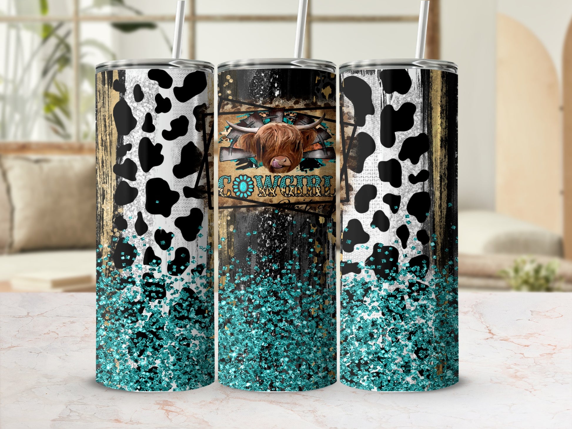 Cowgirl tumbler with cow print and turquoise glitter.