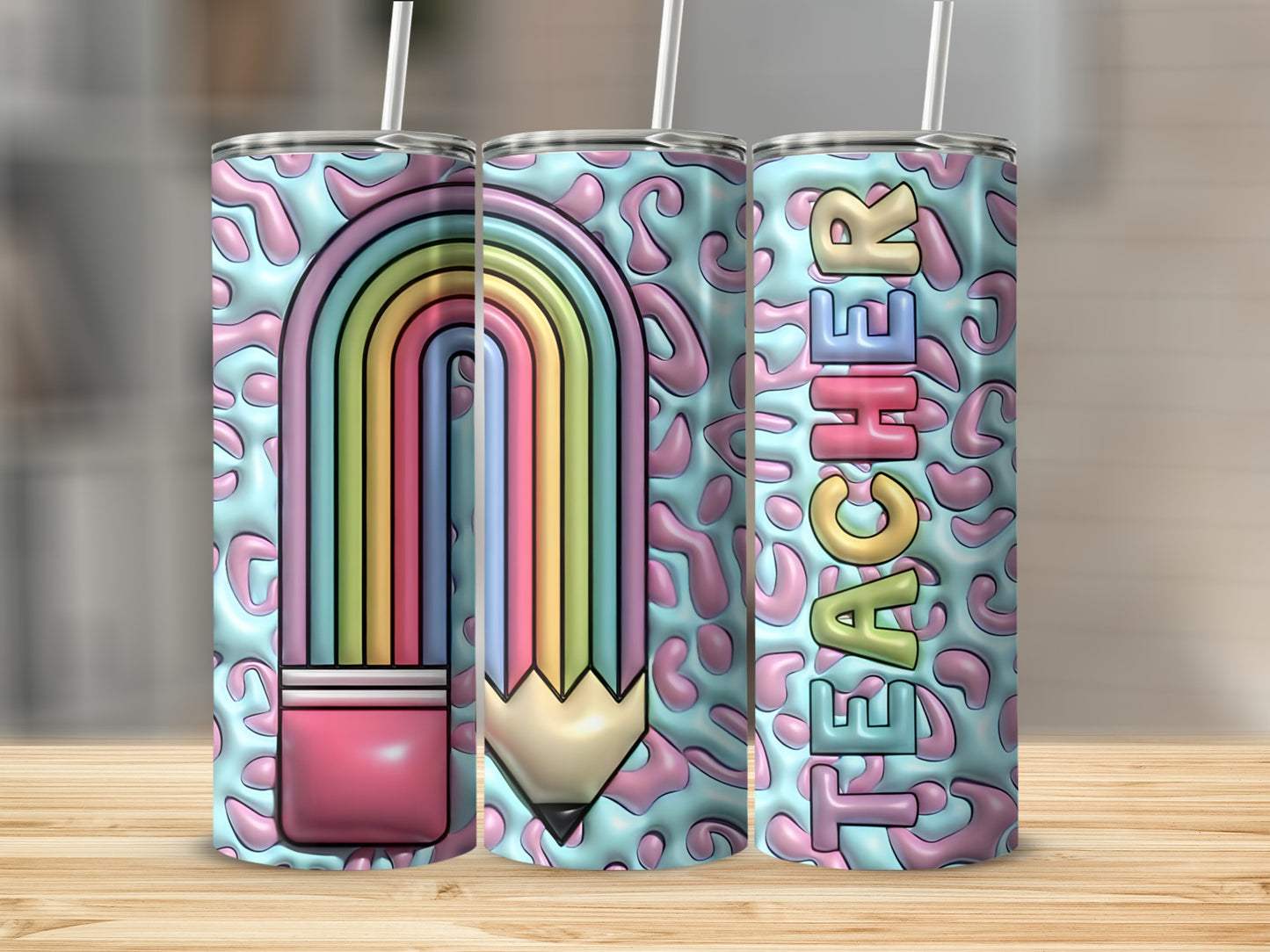 Teacher tumbler with rainbow and pencil design on leopard print background.