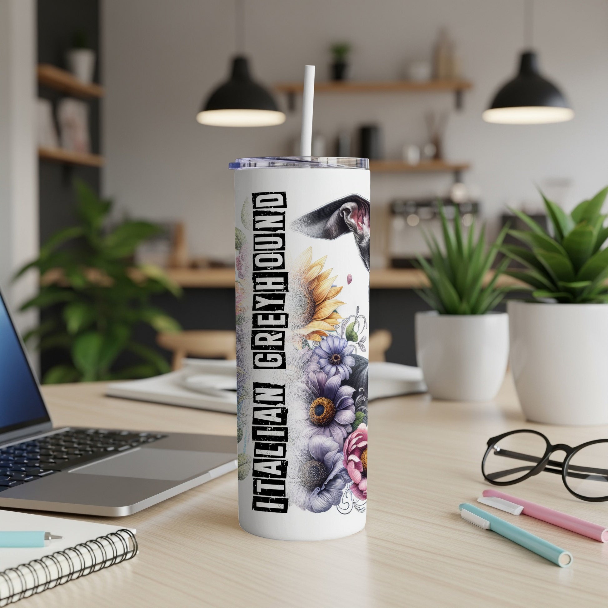 Tall tumbler with Italian Greyhound and floral design on desk.
