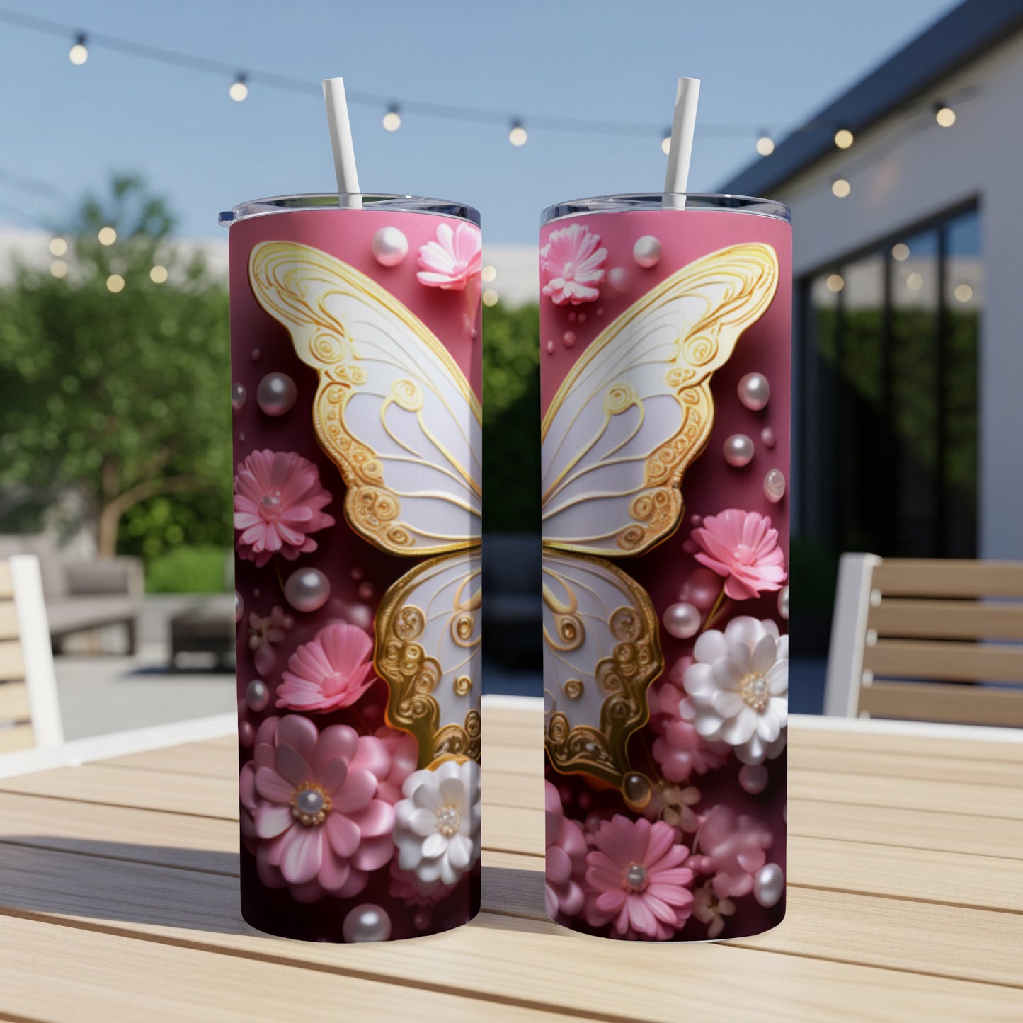 Two pink tumblers with white and gold butterfly wings and floral accents.