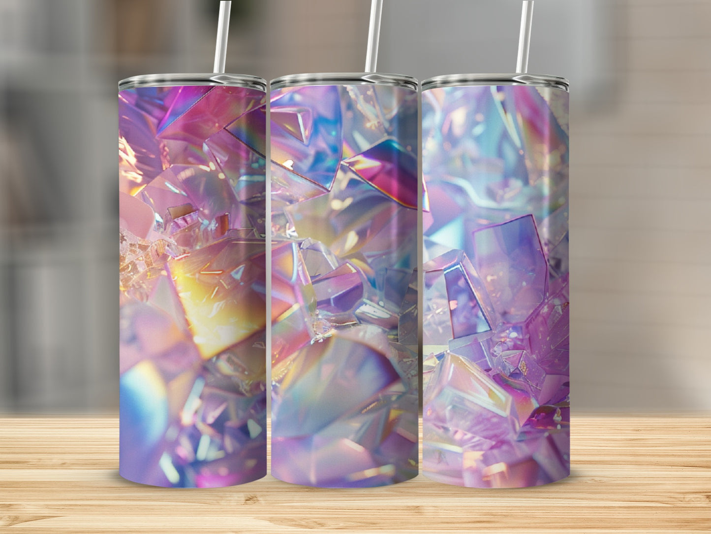 Three iridescent prism tumblers with straws on a wooden surface.