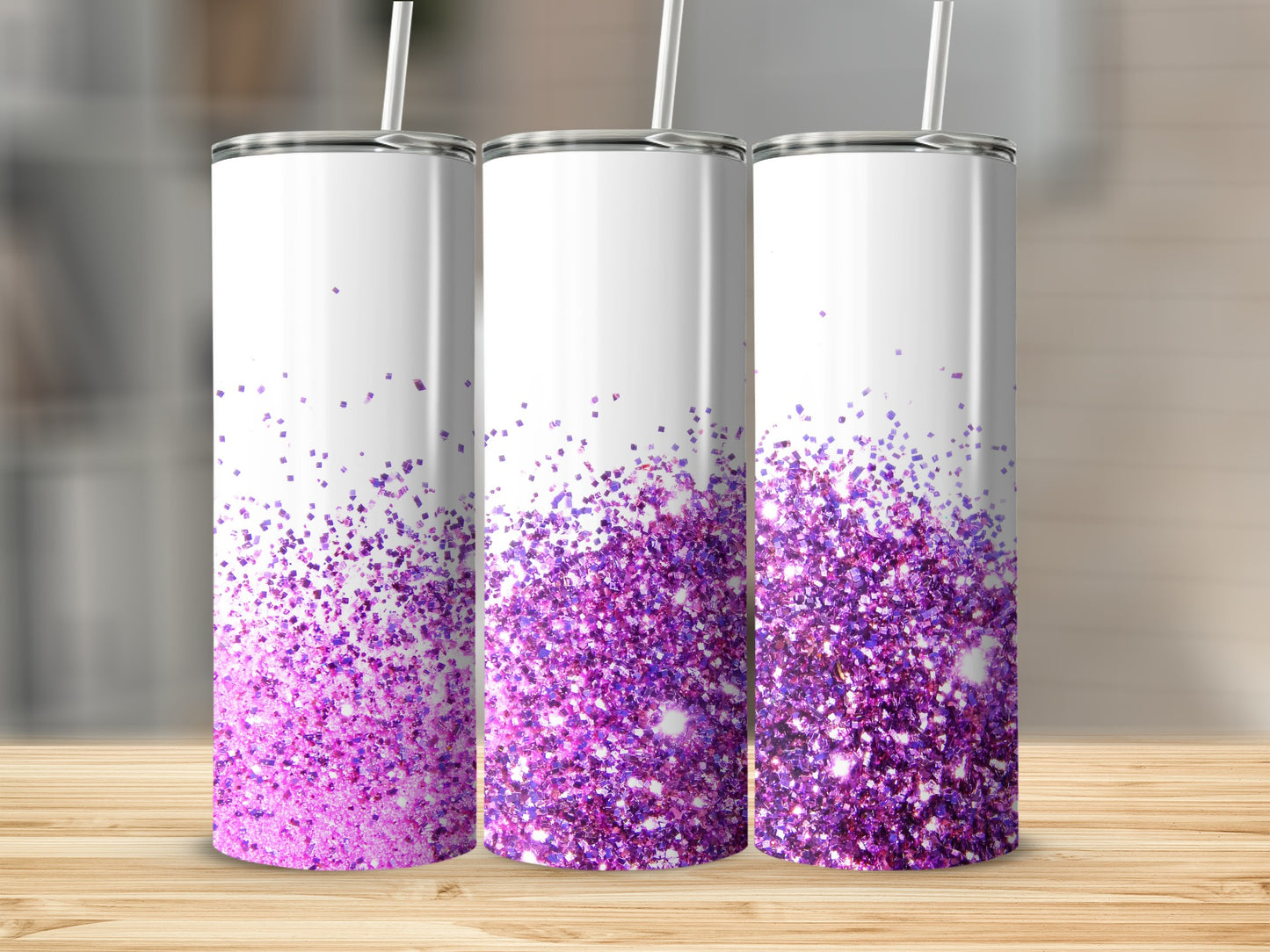 Three white tumblers with a gradient of pink and purple glitter.