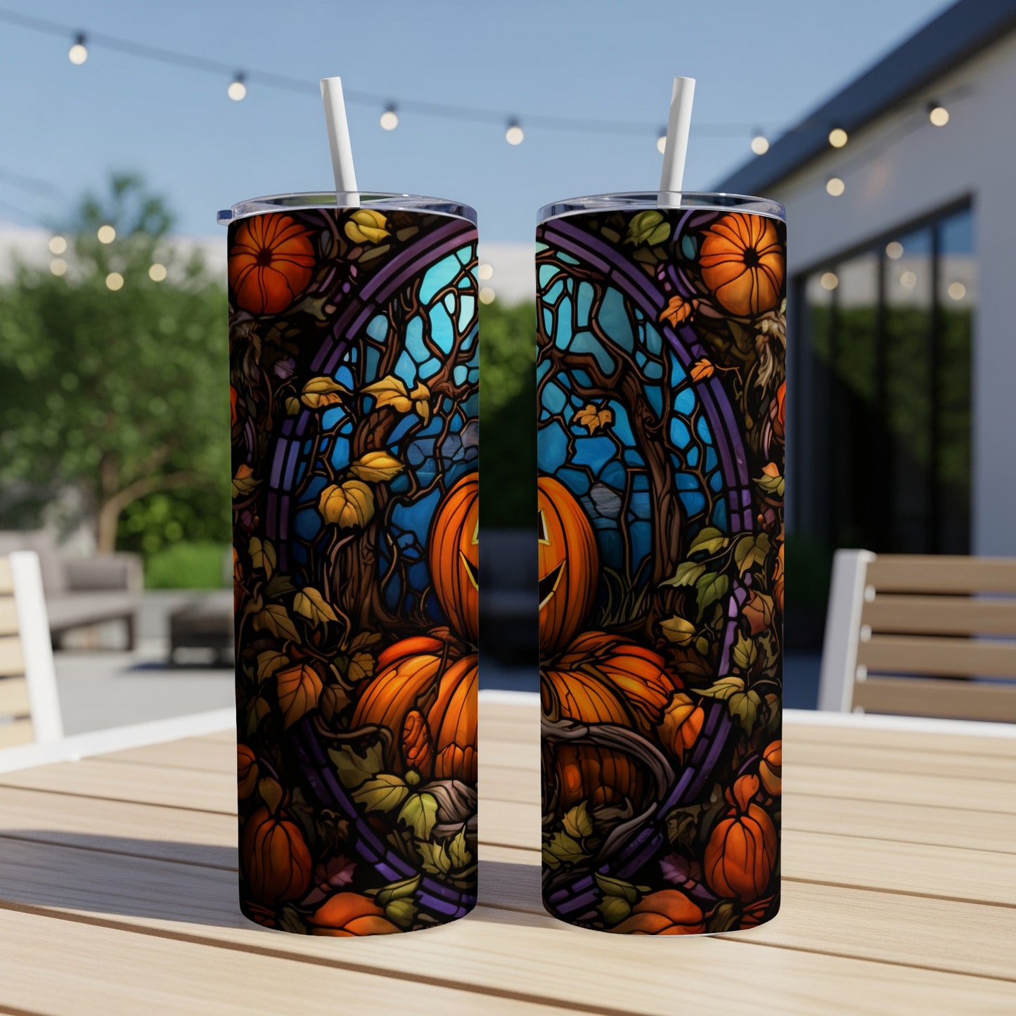 Two tall tumblers with stained-glass style Halloween pumpkin and vine design.