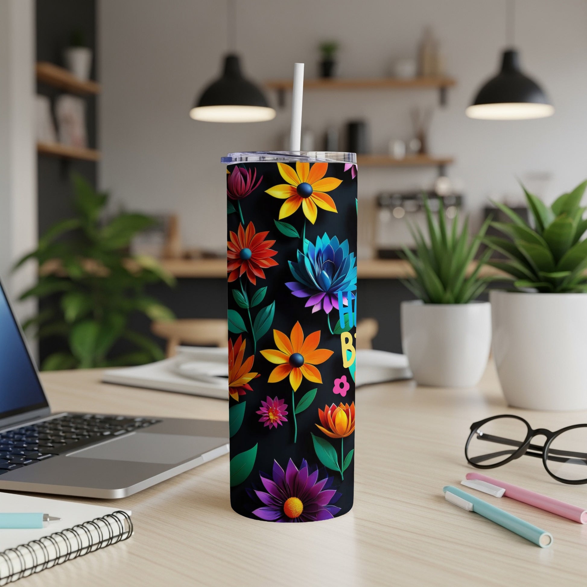 Black tumbler with colorful flowers and "Birthday" text.