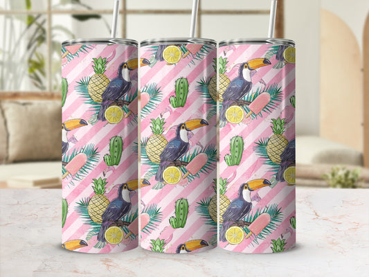 Toucan and flamingo tropical pattern on three tumblers with straws.