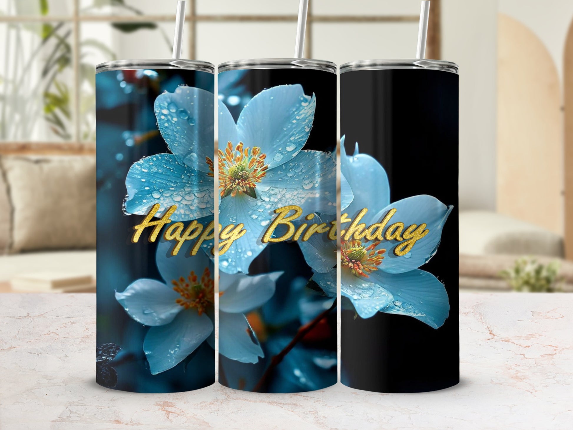 Tumbler with blue flowers and "Happy Birthday" text.