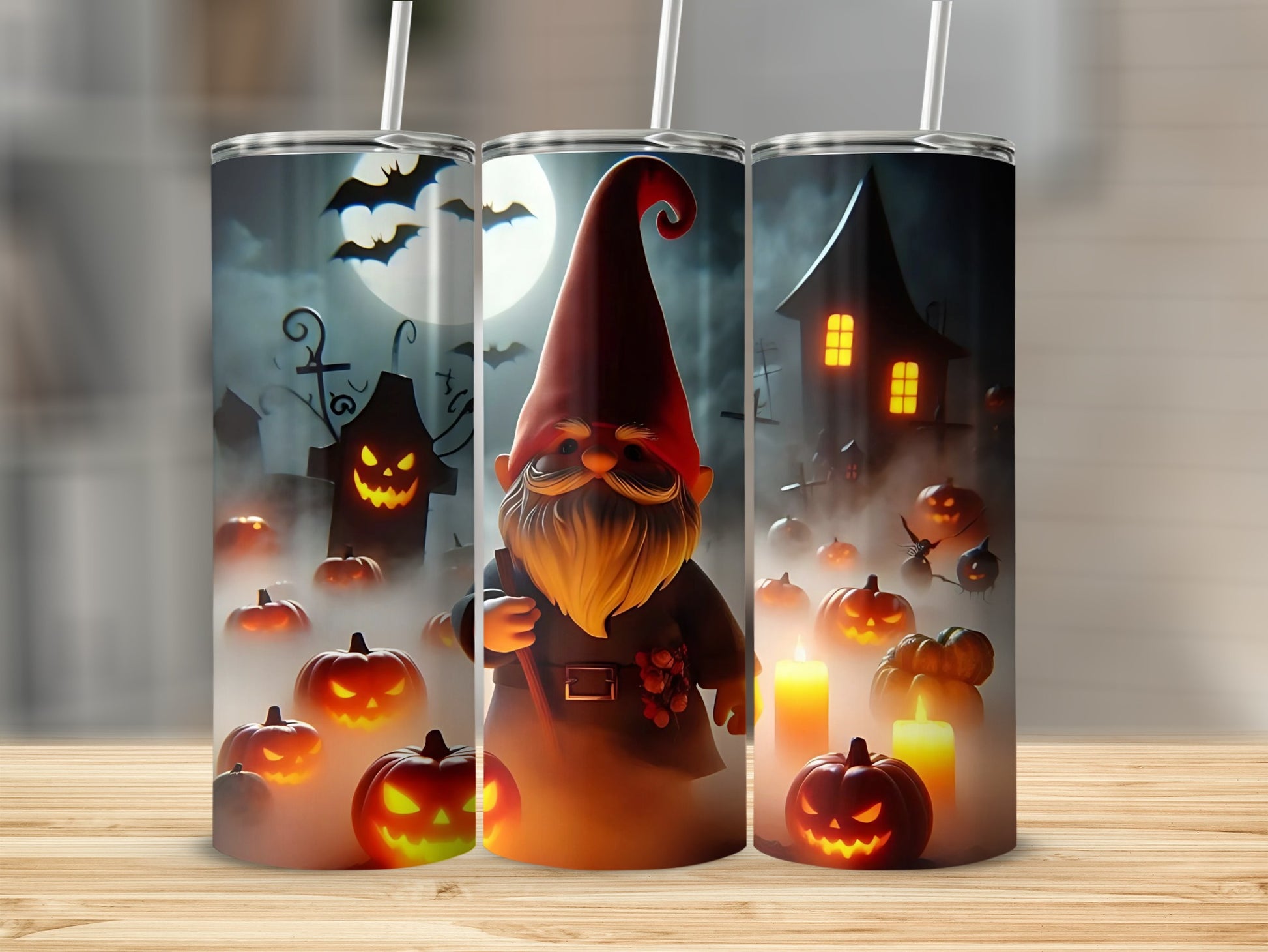 Halloween-themed tumbler with a gnome, pumpkins, bats, and a haunted house.