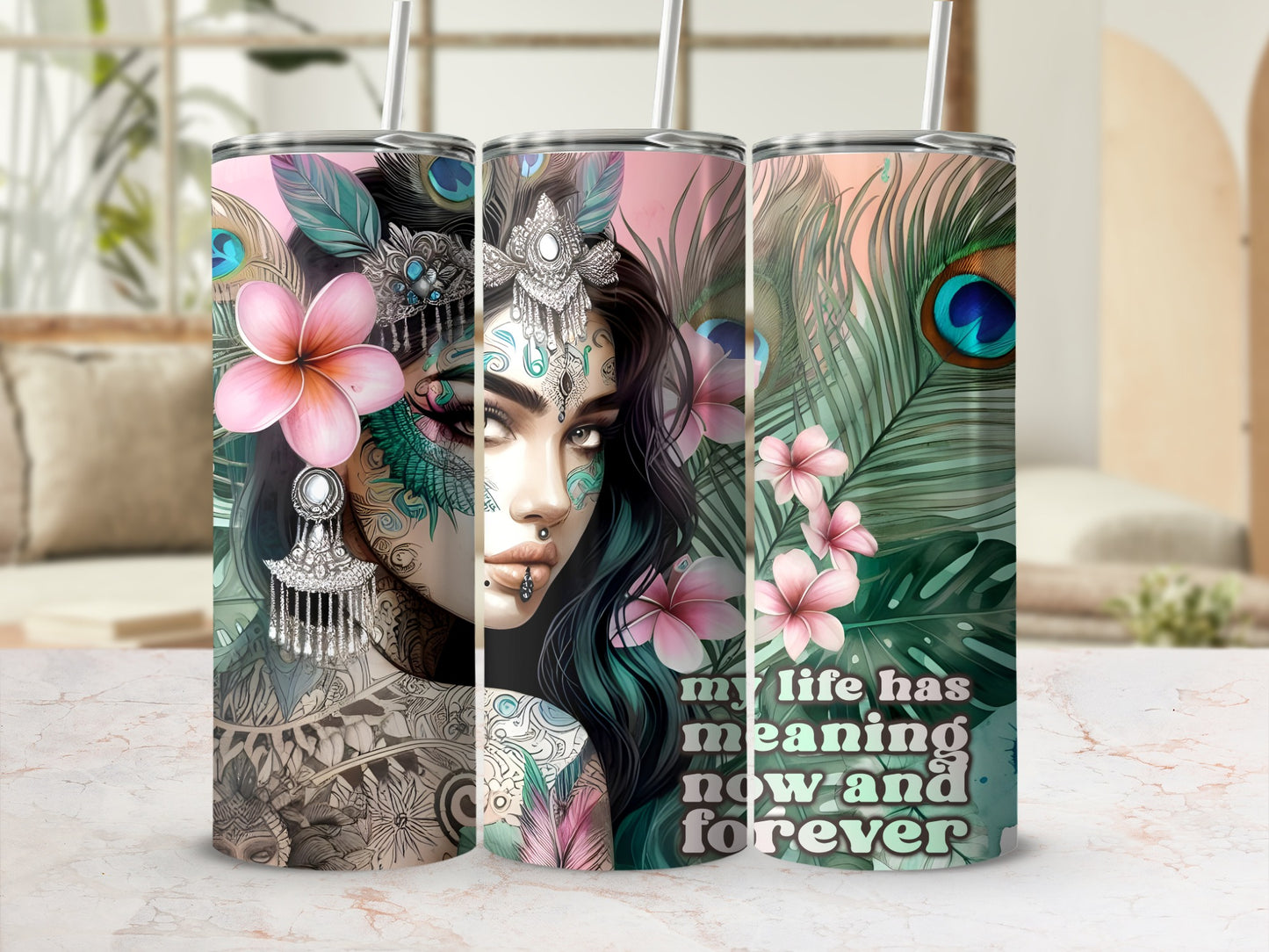 Tumbler with woman's face, feathers, and "my life has meaning now and forever" text.