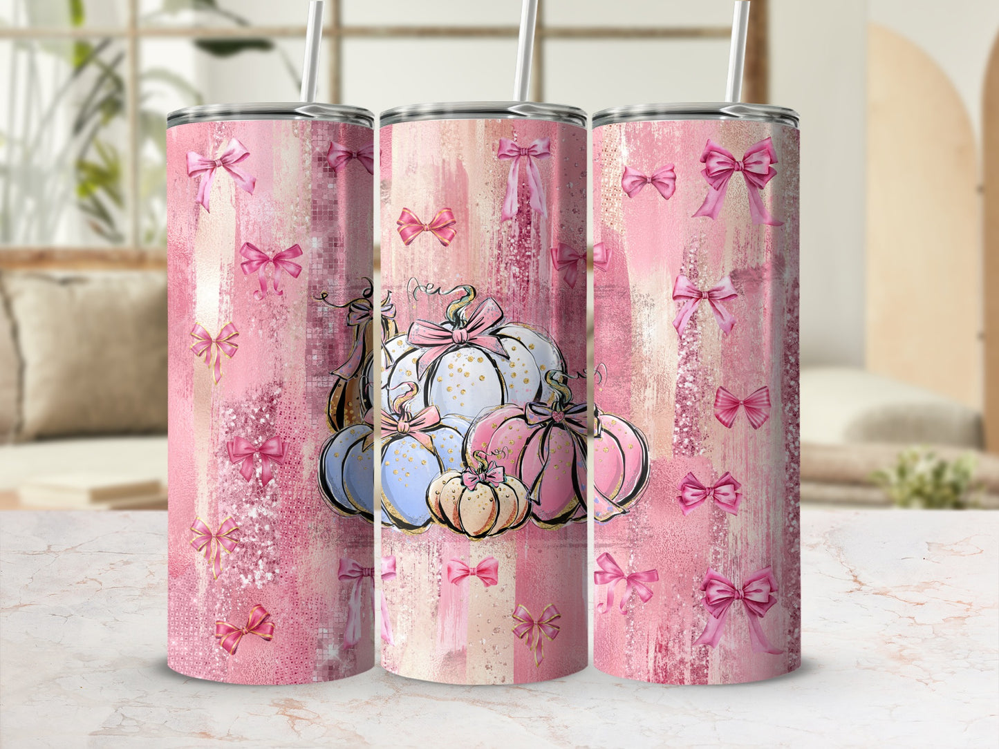 Pink abstract background with scattered bows and blue and pink pumpkins.