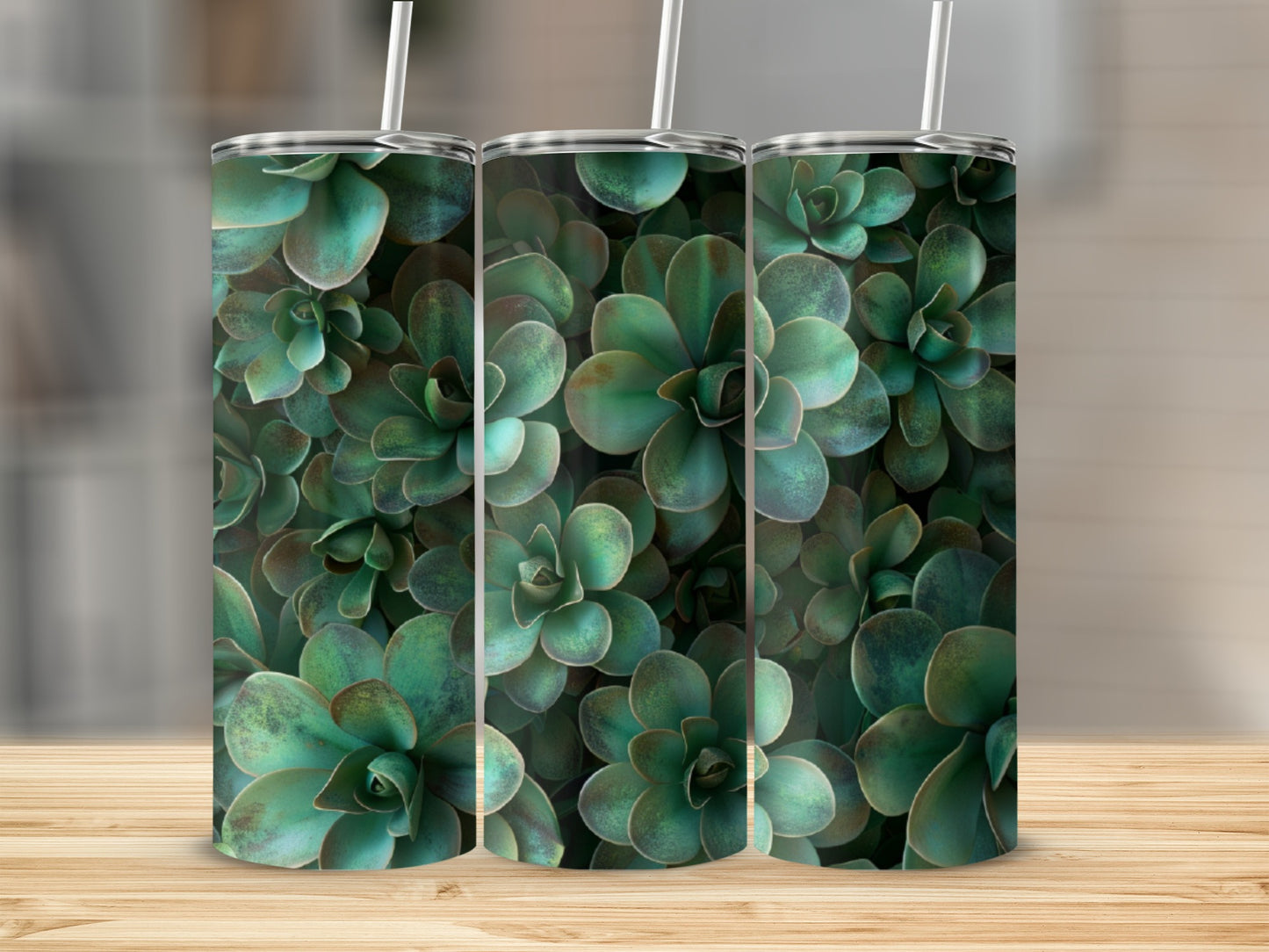 Three tumblers with a close-up pattern of green succulents.