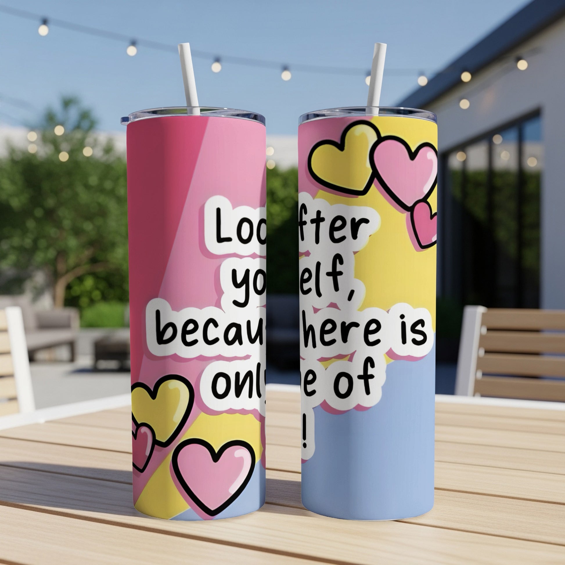 Tumbler with "Look after yourself, because here is only love!" text and heart designs.