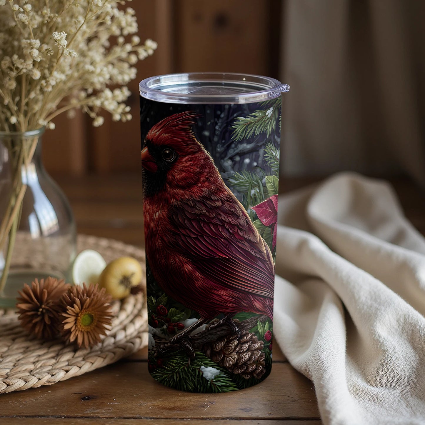 Vibrant red cardinal insulated tumbler with nature background