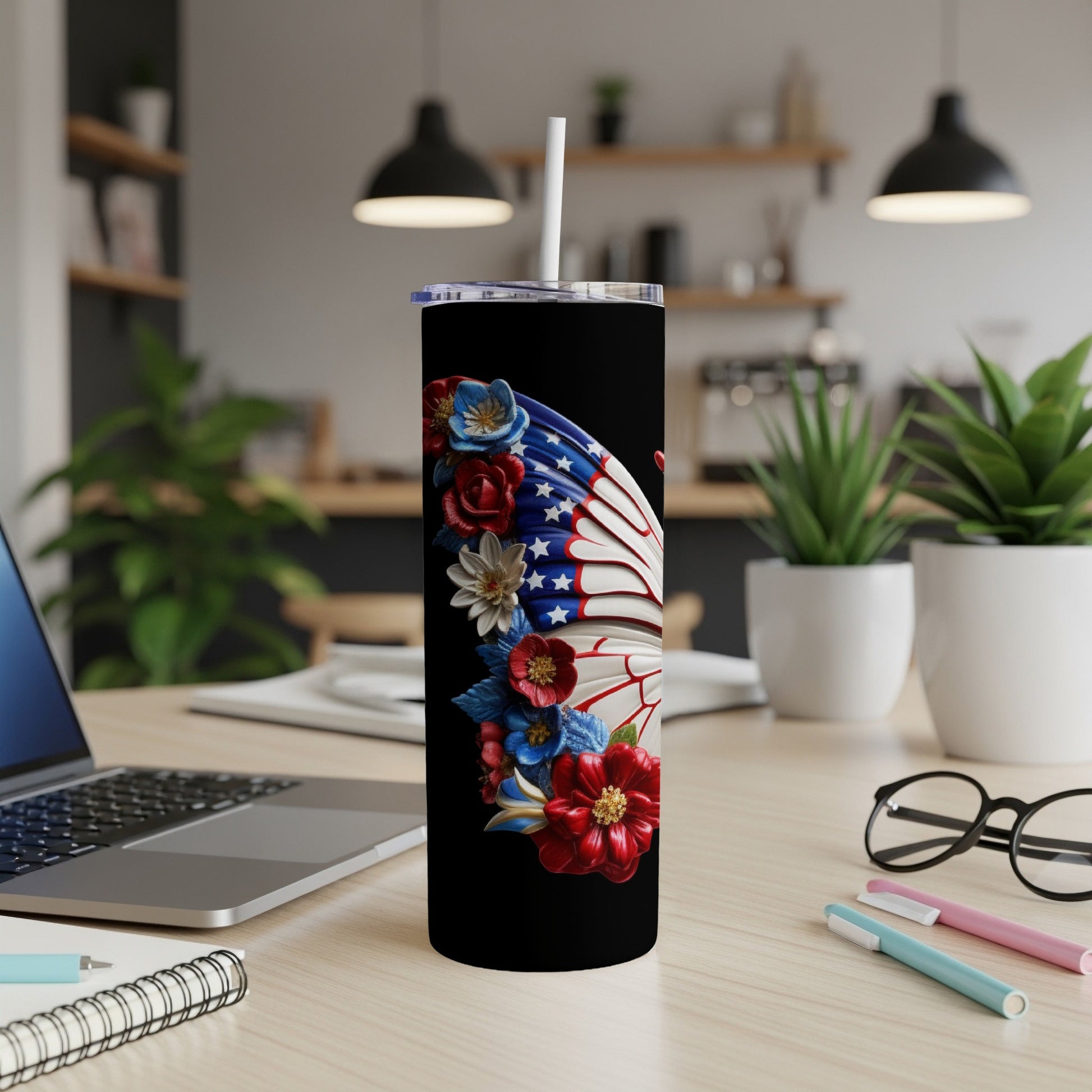 Black tumbler with patriotic butterfly wings and floral design.
