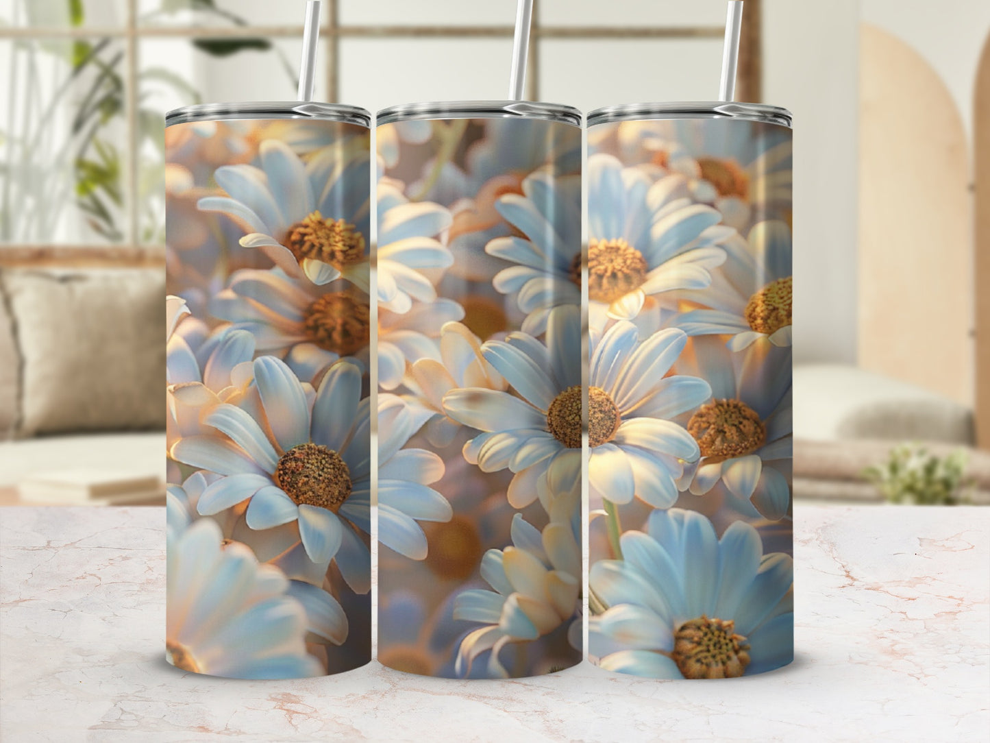 Three tumblers with a close-up floral daisy pattern in soft, warm light.