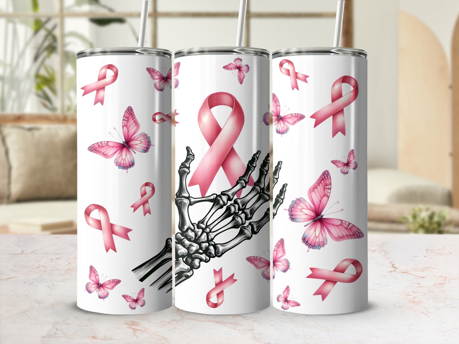 Skeleton hand with pink ribbon and butterflies on a tumbler.