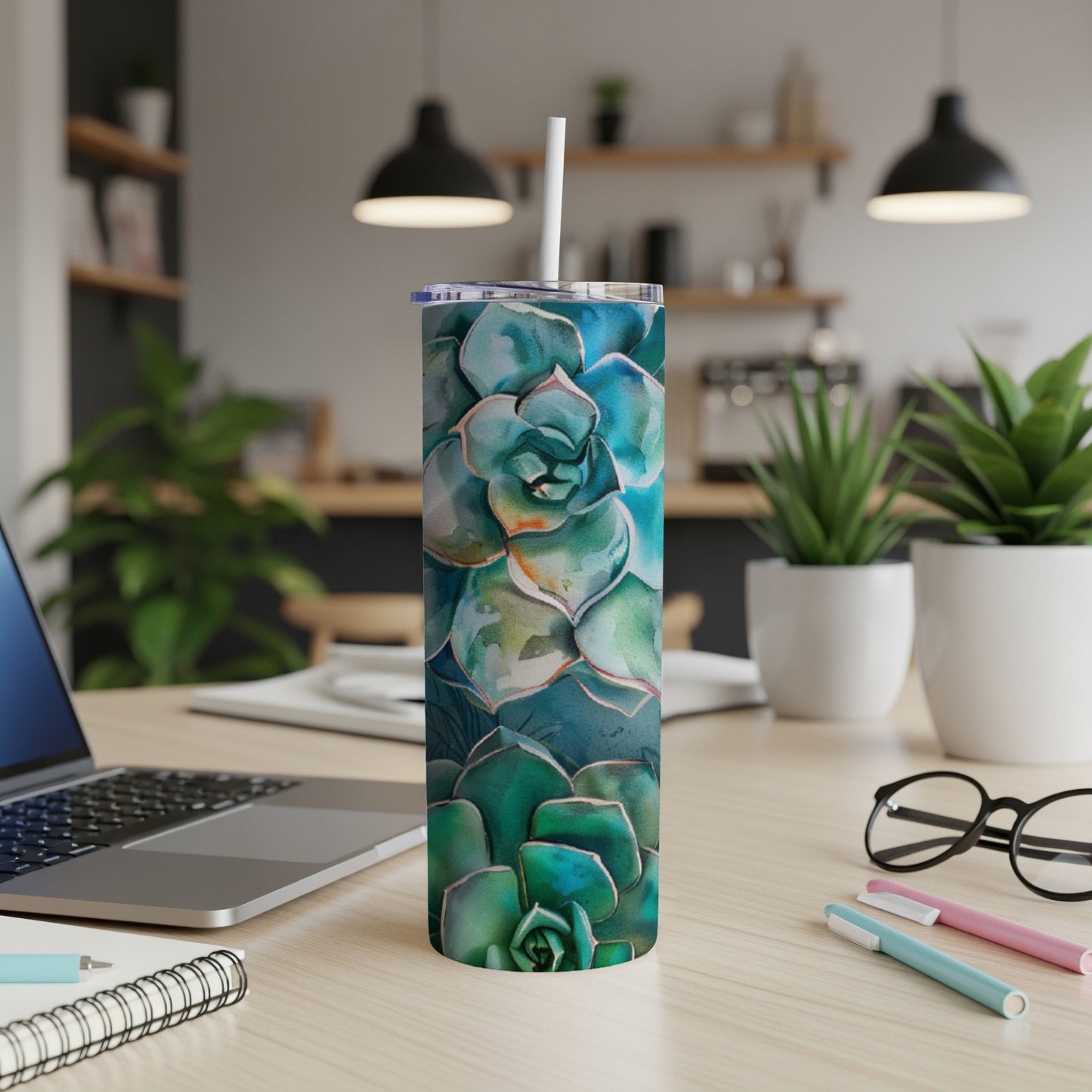 Succulent watercolor print on a white stainless steel tumbler with straw.