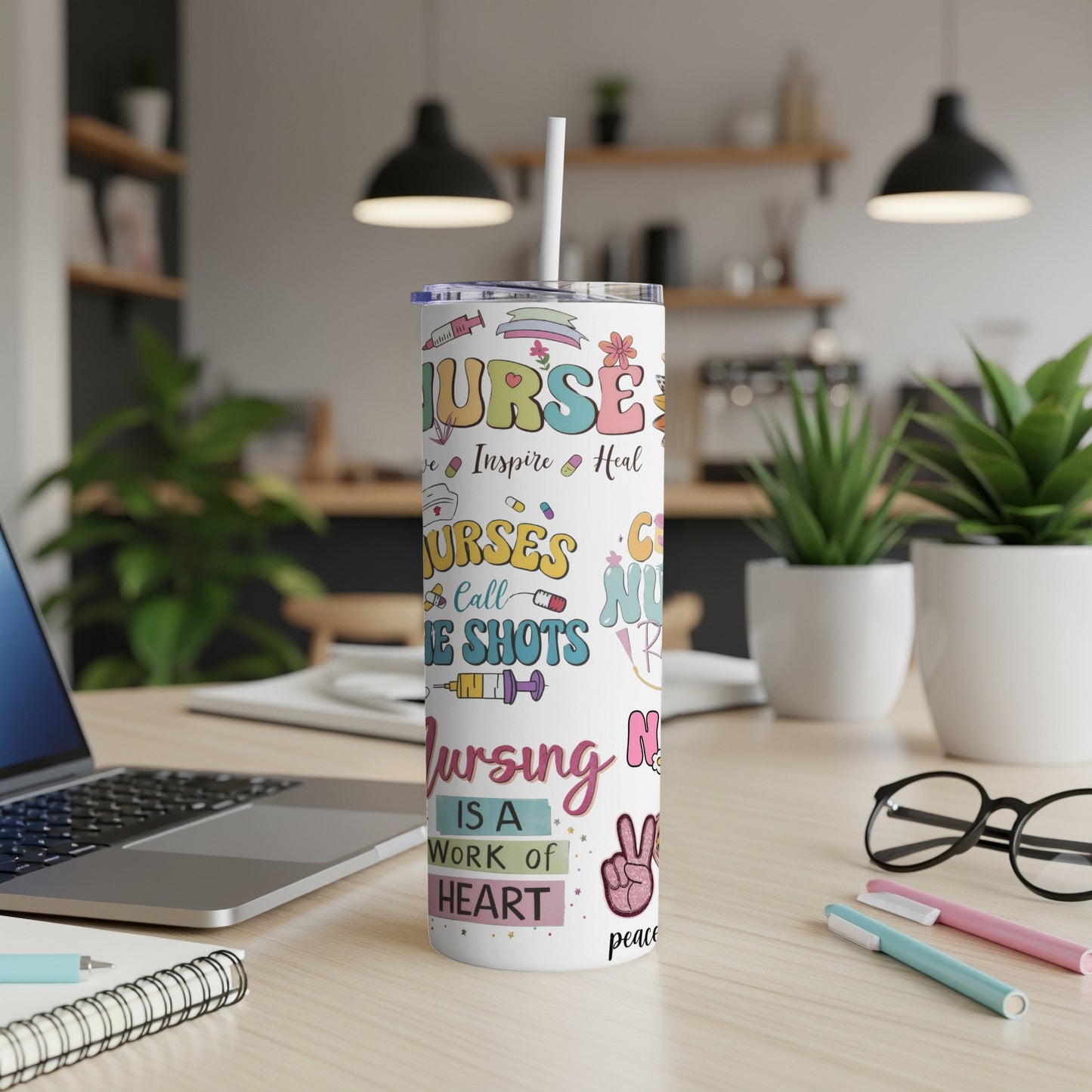 "Nurses" tumbler with medical and positive affirmations, on a desk.