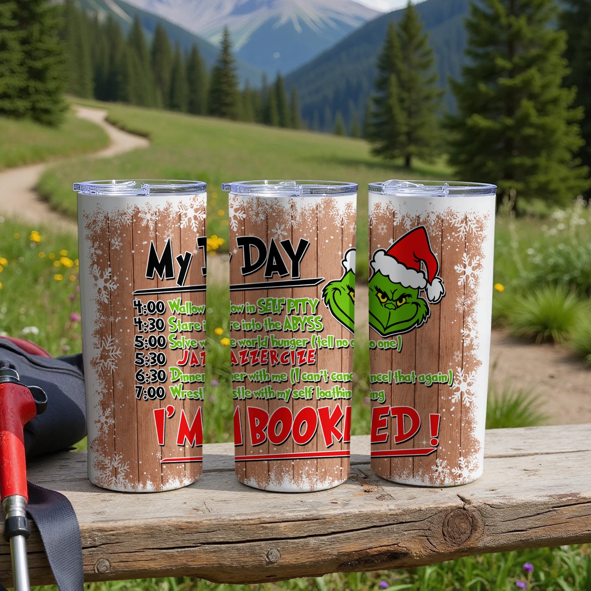 Three festive tumblers with Christmas-themed quotes about a bad day.
