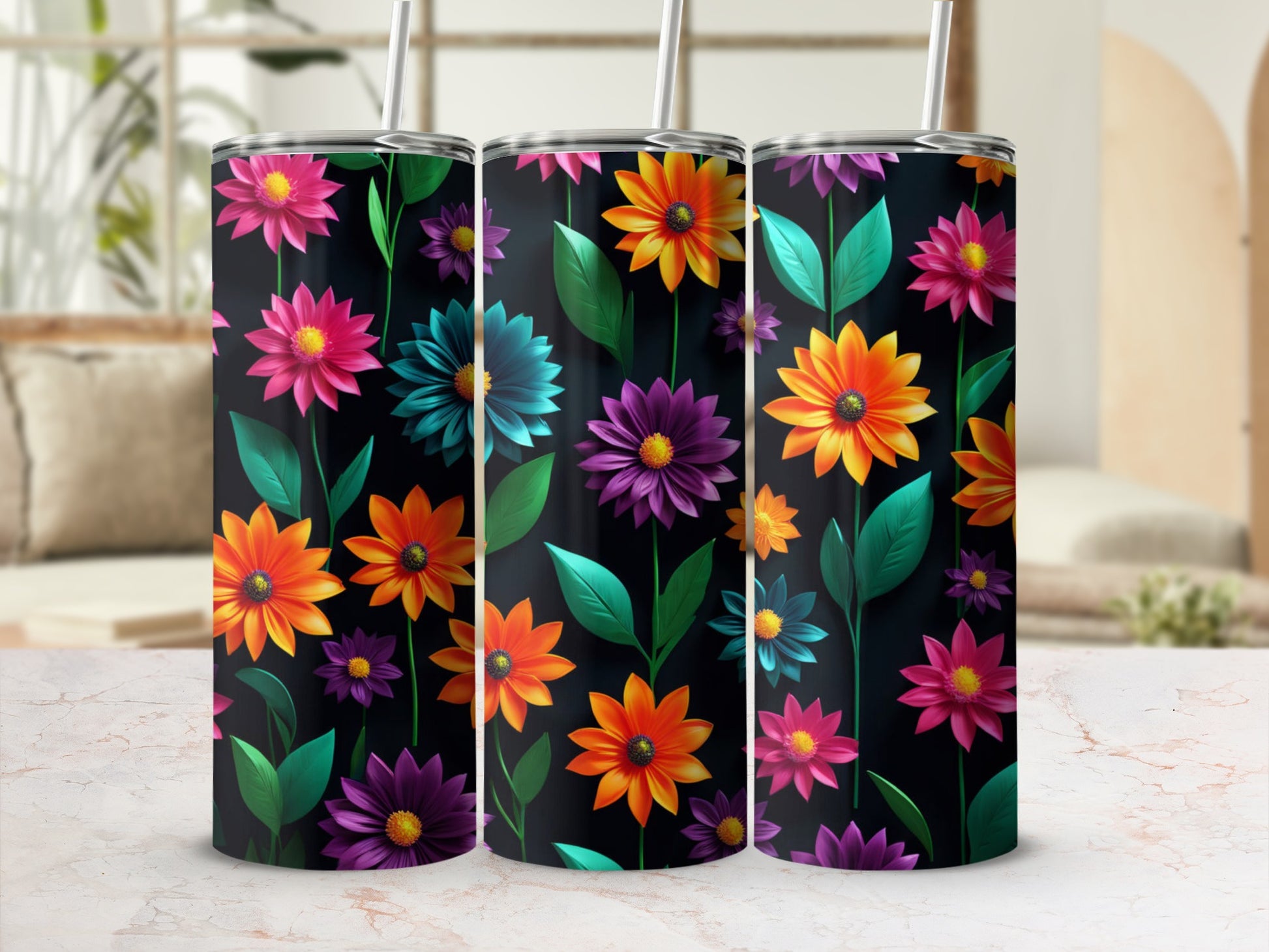 Three tumblers with a colorful floral pattern on a black background.