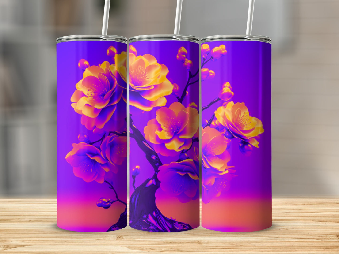 Three tumblers with vibrant purple and orange floral designs.