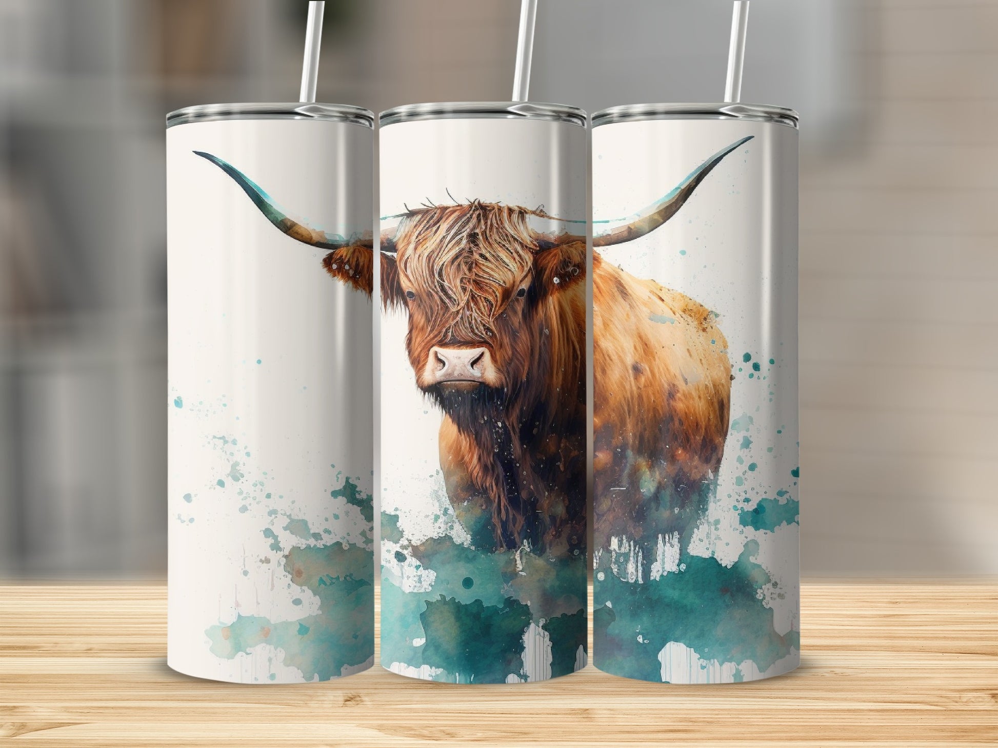 Watercolor highland cow portrait on three tumblers.