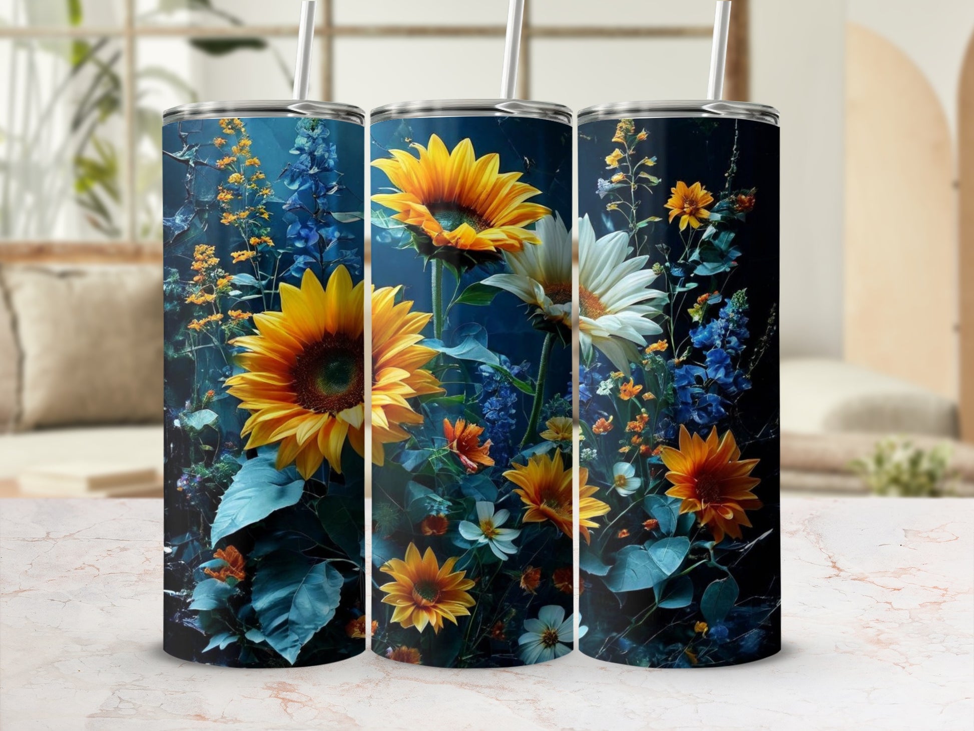 Three tumblers featuring sunflowers and assorted colorful wildflowers on a dark background.