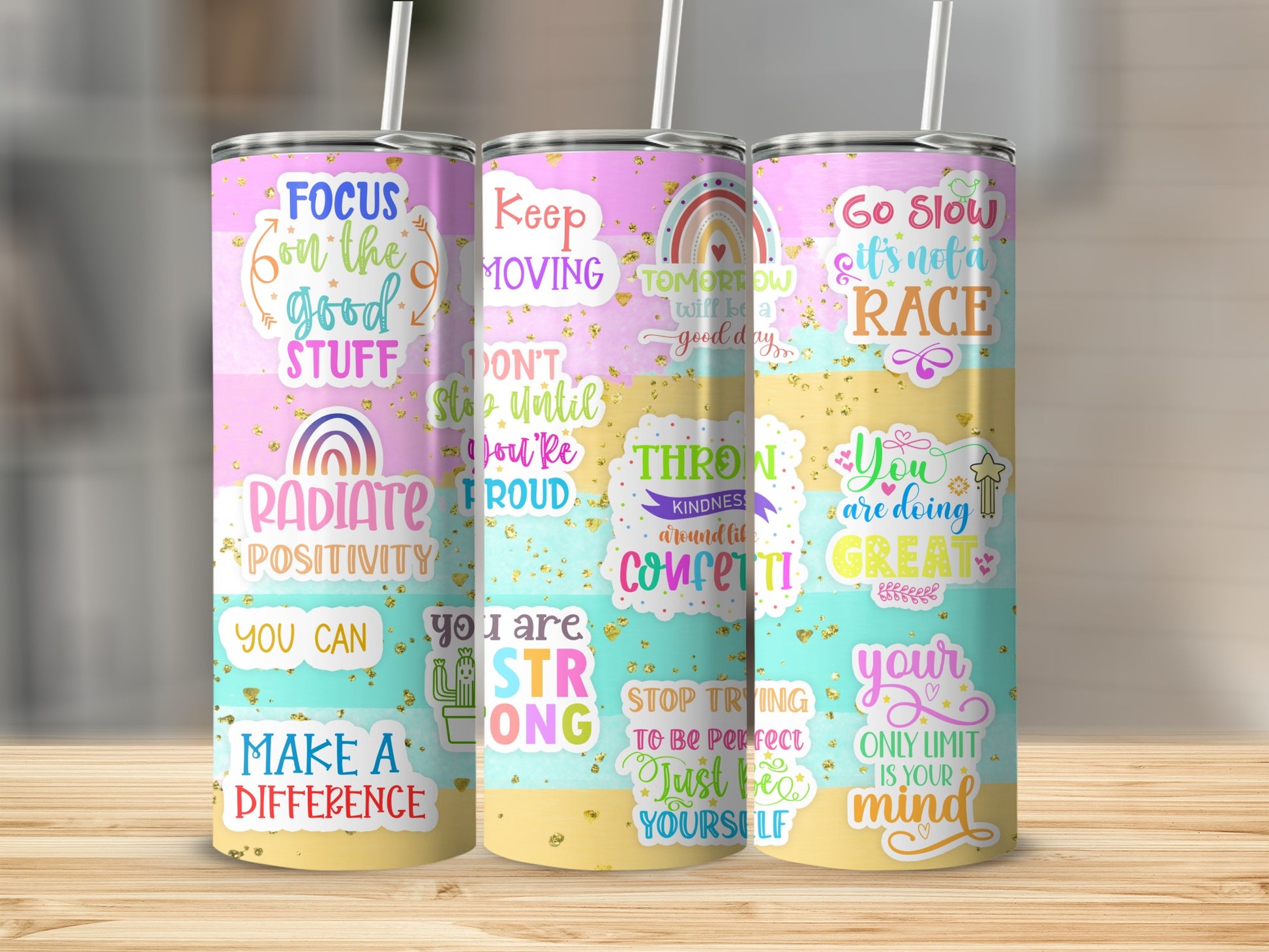 Tumbler with motivational quotes in pastel colors: "Focus on the good," "Keep moving," and "Go slow."