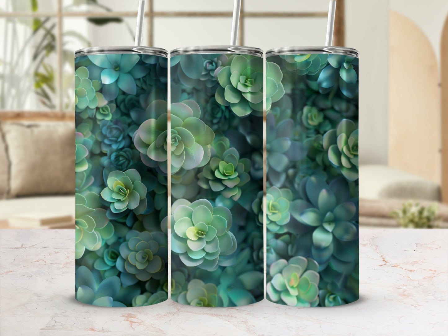 Green and blue succulents pattern on a cylindrical tumbler with straw.