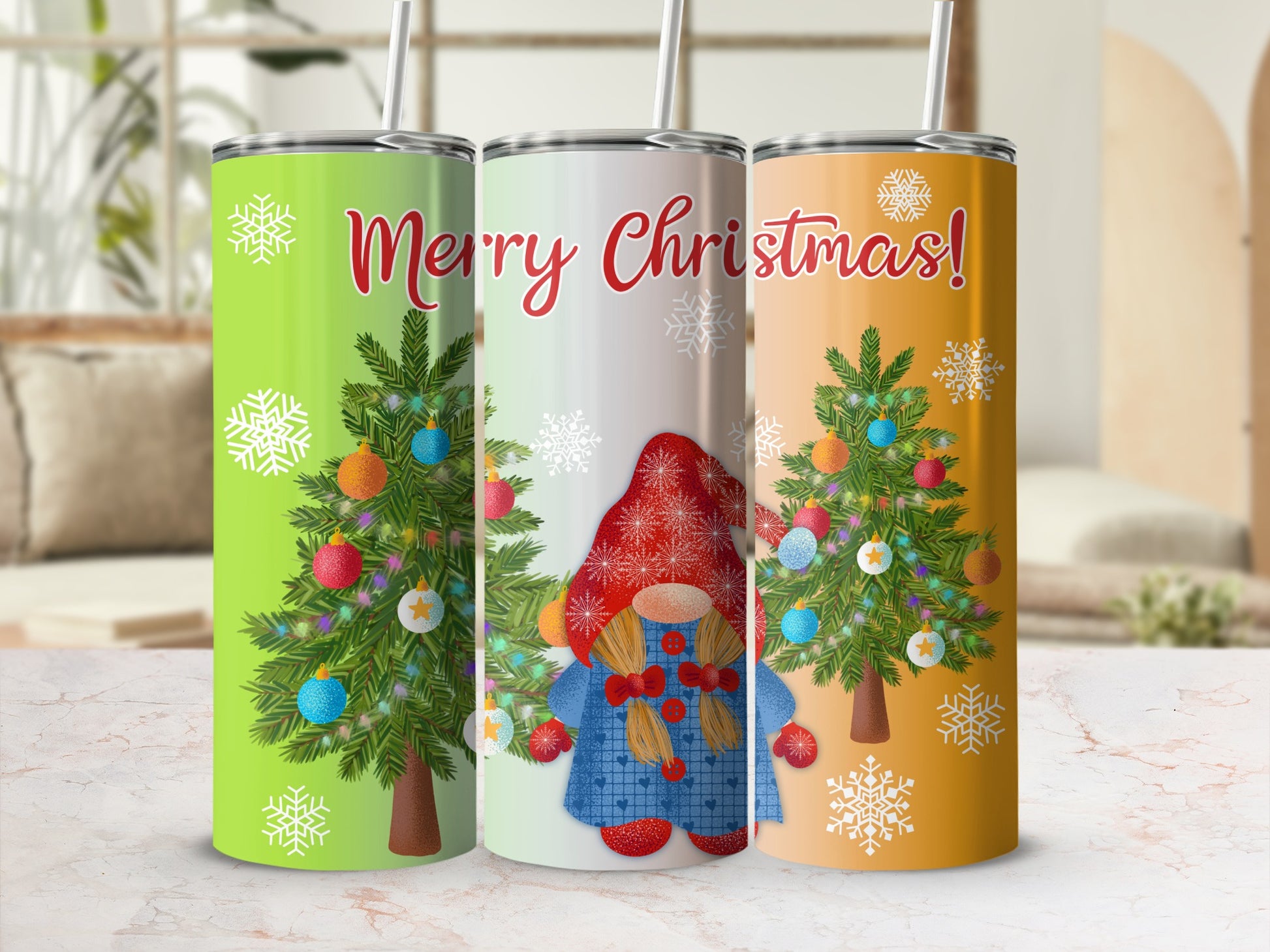 Three Christmas-themed tumblers with festive gnomes and trees.