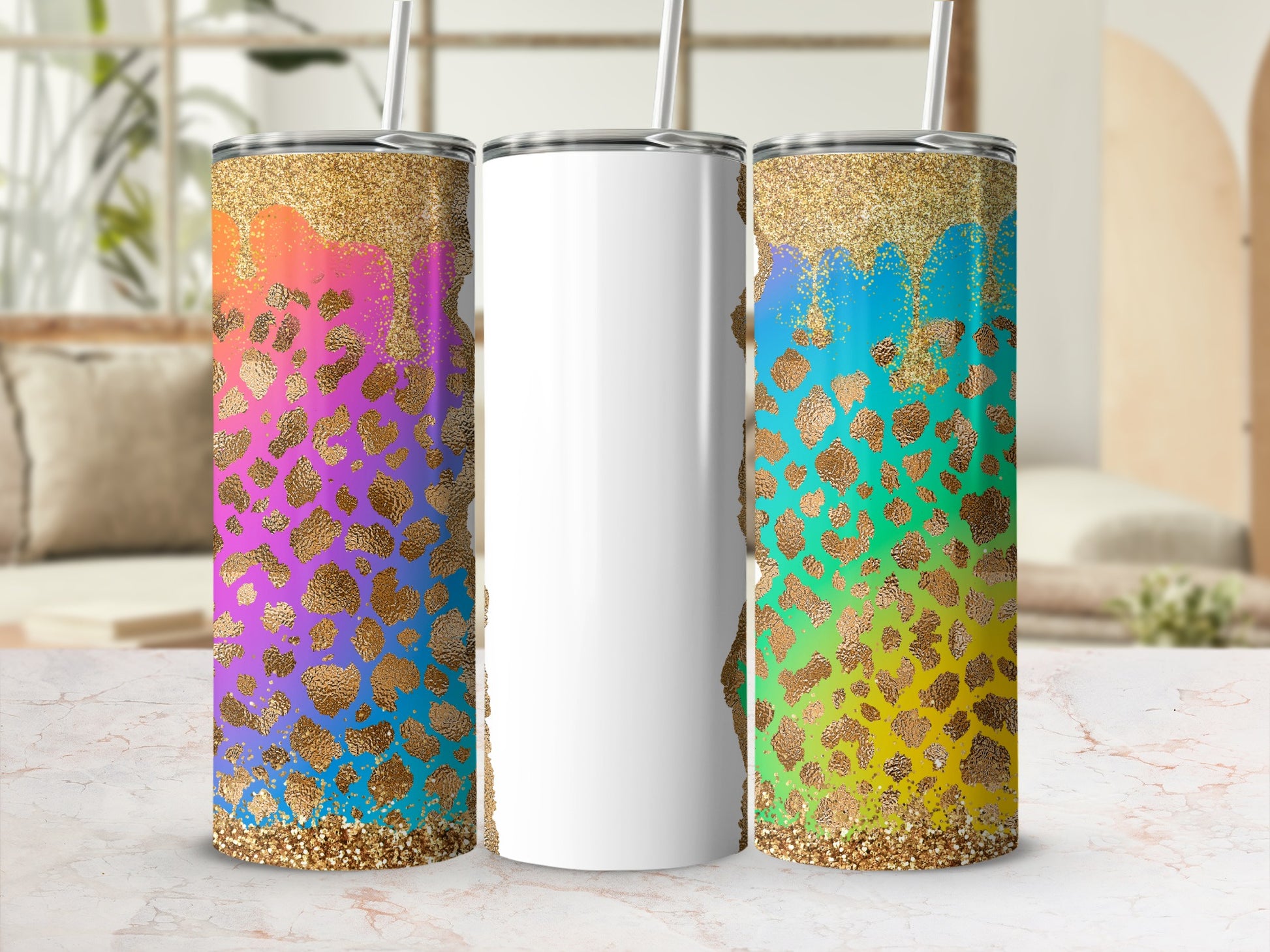 Three glitter and leopard print tumblers with straws, two with colorful patterns.