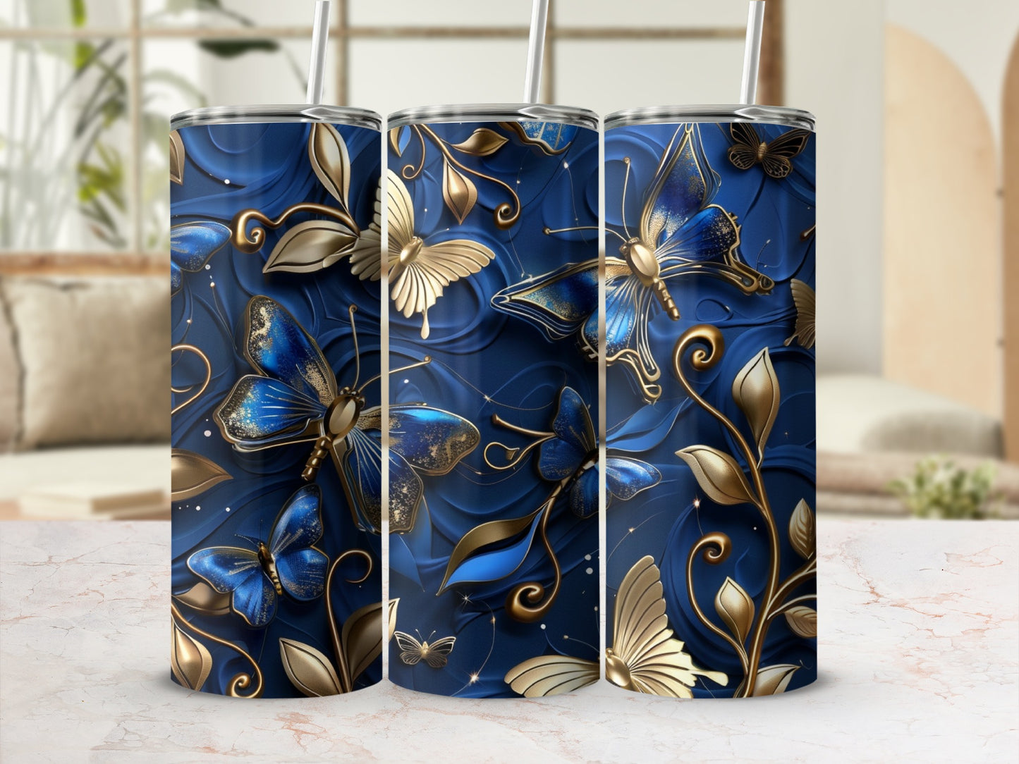 Dark blue tumbler with gold butterflies and floral accents.