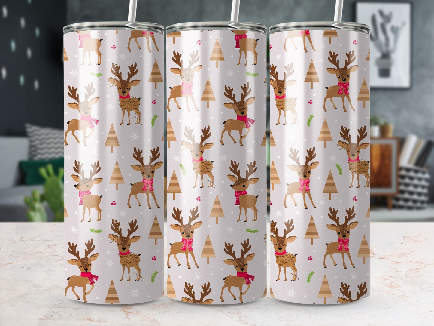 Pattern of deer and trees on a light pink Christmas tumbler.