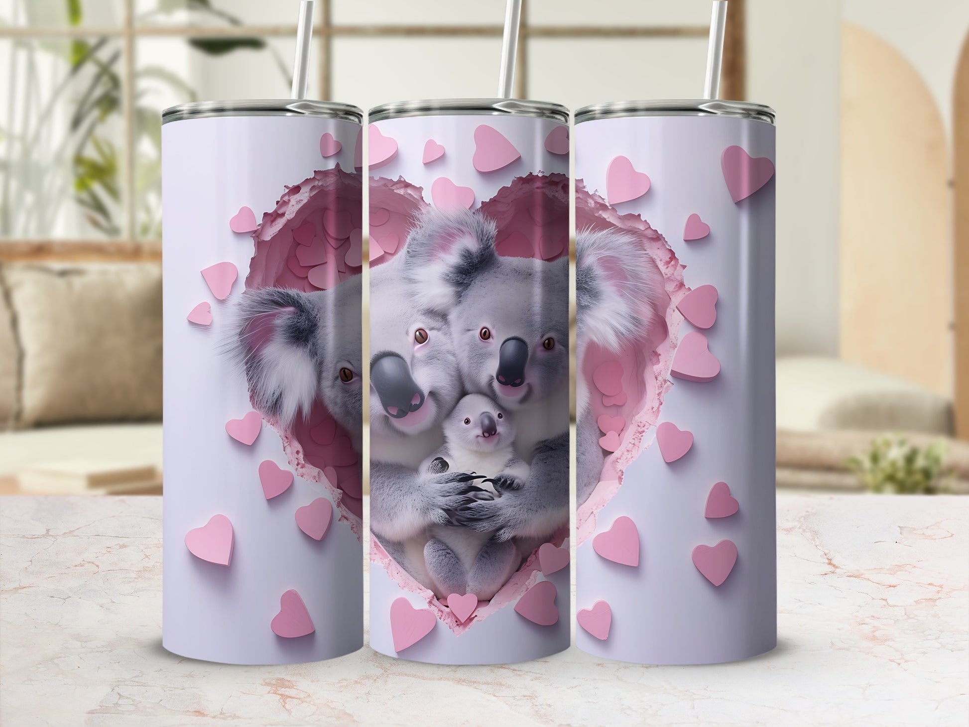Three koalas in a heart-shaped opening with pink hearts.