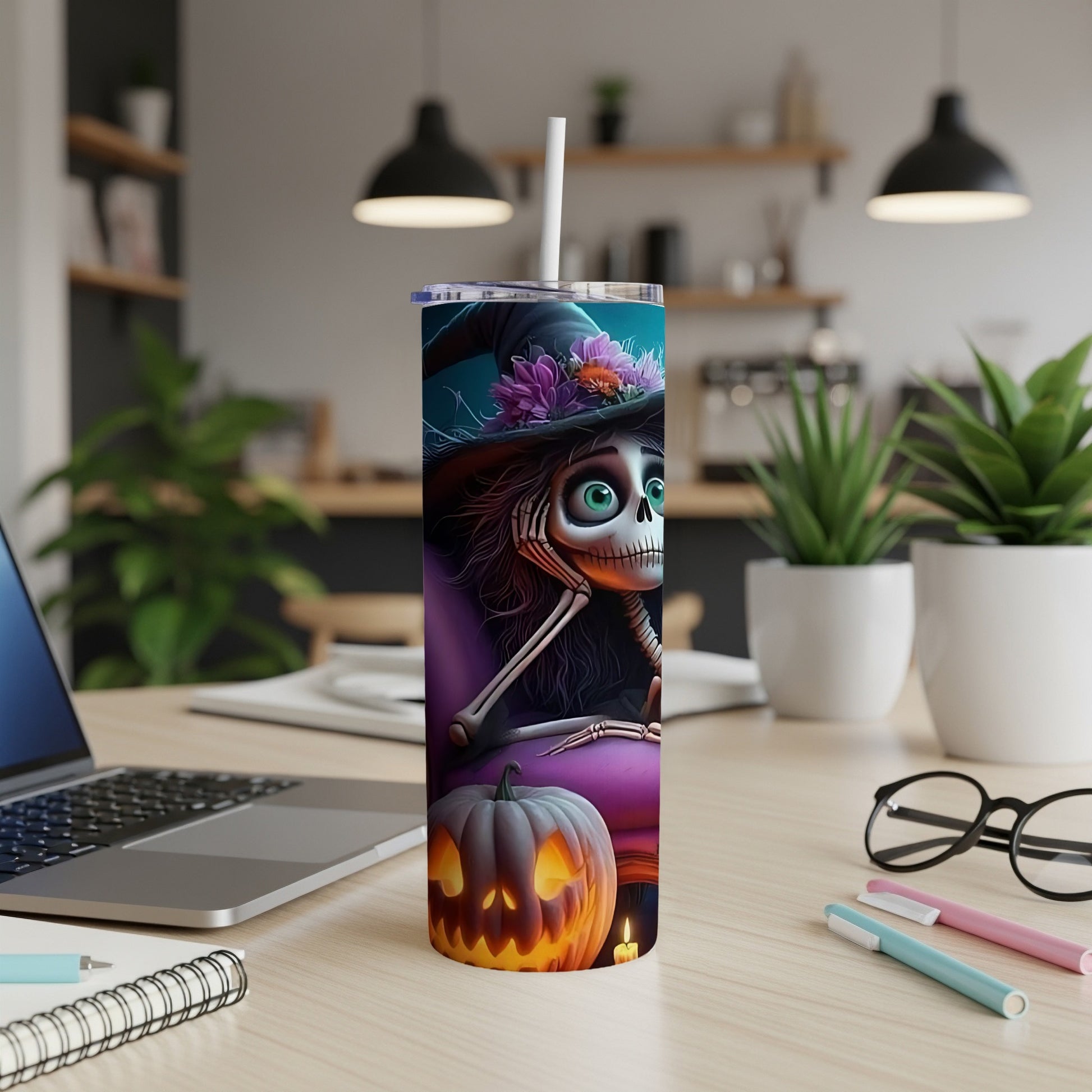 Halloween skeleton tumbler with witch hat, flowers, and jack-o'-lantern.