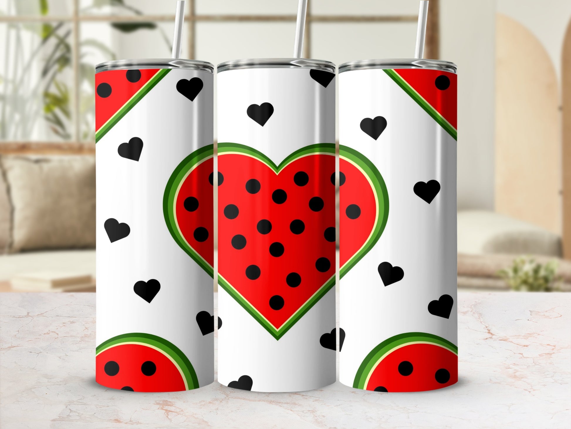 White tumbler with watermelon heart and black dot pattern.